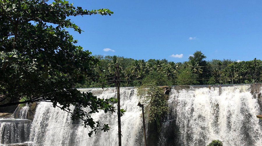 Thirparappu Waterfalls Kanyakumari, cascading waters in a natural rock formation.