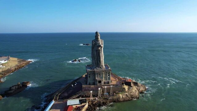 Majestic Thiruvalluvar Statue Kanyakumari, standing tall against the ocean backdrop.