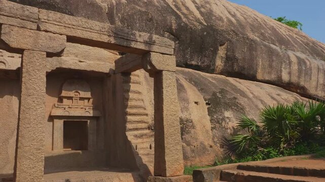 The Varaha Cave Temple, a rock-cut mandapa featuring large sculptures of Vishnu and Goddess Earth.