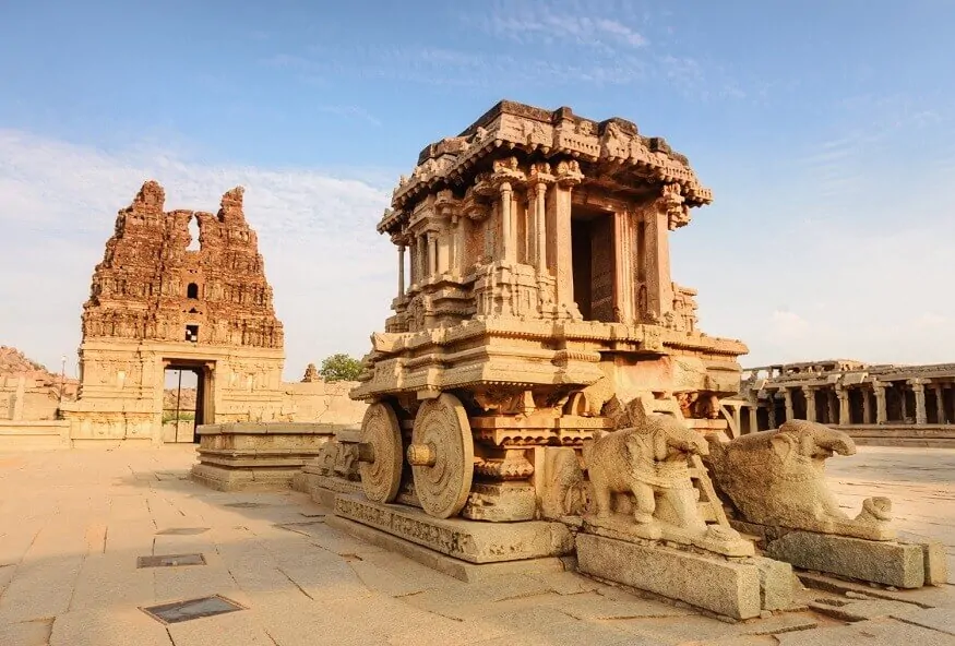 The iconic stone chariot and musical pillars of the Vijaya Vittala Temple showcase the innovative craftsmanship among Central India's Famous Archaeological Marvels.