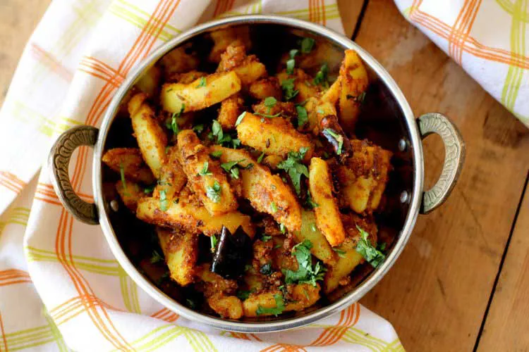 A plate of spicy and crispy fried potatoes, the popular Garhwali dish called Aloo Ke Gutke.