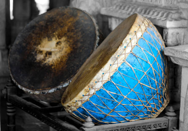 Traditional Gondhal folk performers with instruments at a village ritual in Maharashtra.