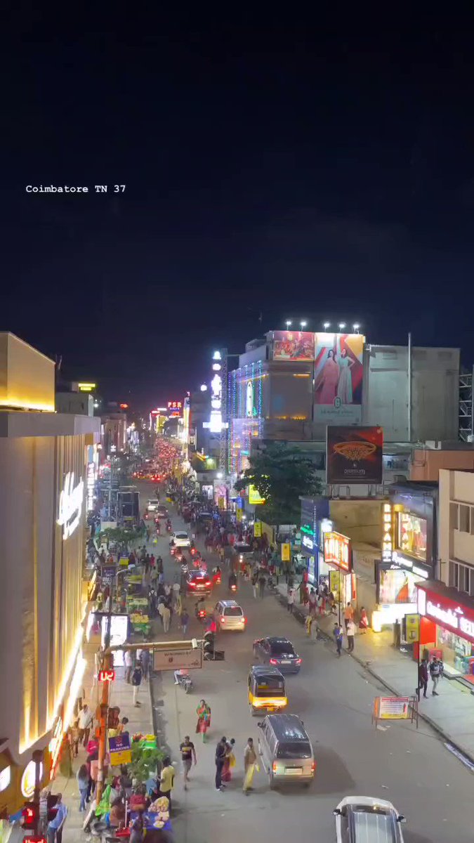 Busy shopping scene on Cross Cut Road, a vibrant commercial place to visit in Coimbatore.