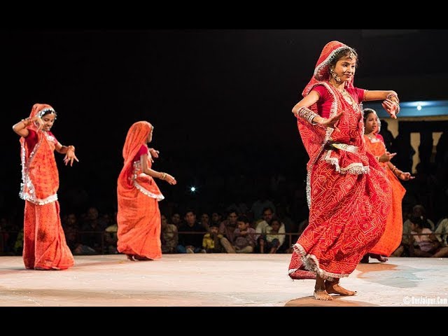 A couple performing the graceful and expressive Jat-Jatin folk dance of Bihar.