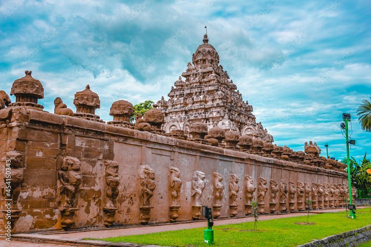 Ancient stone facade and detailed sculptural carvings of the historic Kailasanathar Temple in Kanchipuram, showcasing classic Pallava architecture.