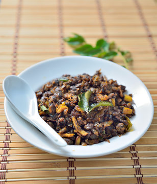 Kallumakkaya Ularthiyathu, a spicy stir-fry of mussels from Kozhikode.