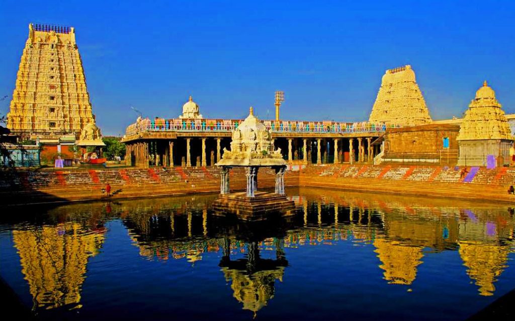 Golden temple gopuram and ornate entrance of the sacred Kamakshi Amman Temple, a major Shakti Peetha in Kanchipuram.