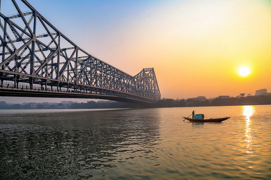 Panoramic skyline of Kolkata city featuring the Victoria Memorial and riverfront.