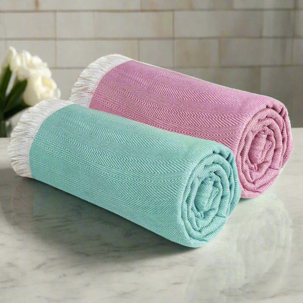 A display of soft and absorbent Kozhikode towels.