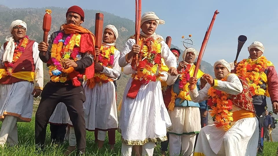 Artists performing Pandava Nritya, a traditional Garhwali folk dance depicting stories from the Mahabharata.