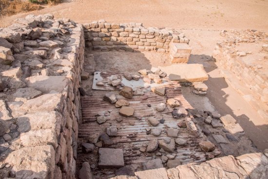 The famous public inscription of ten Harappan script symbols, an ancient signboard, is a unique place to visit in Dholavira.