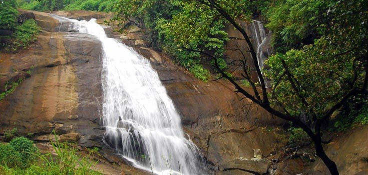 Thusharagiri Waterfalls in the lush Western Ghats near Kozhikode.