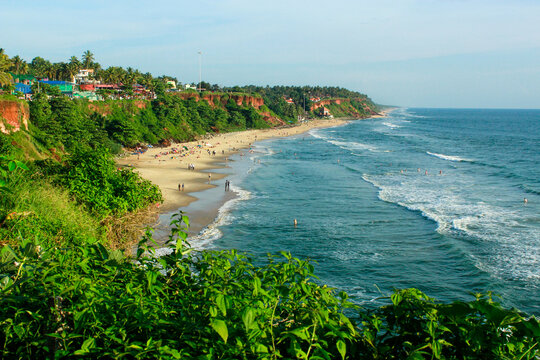The dramatic red cliffs and Papanasam Beach of Varkala, a short drive from Kollam.
