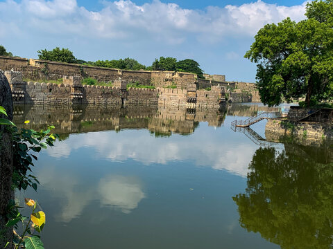 The grand stone entrance and ramparts of Vellore Fort.