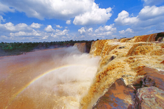 A wide-angle view of the Chitrakote waterfall during monsoon.