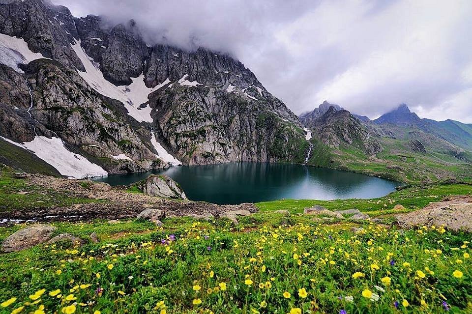 The flower-strewn meadows surrounding the beautiful Gadsar Lake, reached via Sonamarg.