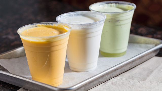 A frothy, refreshing glass of sweet Lassi.