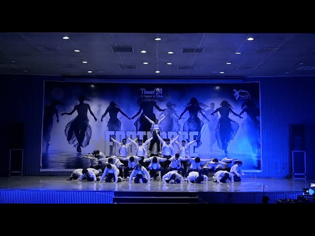 A dynamic and expressive modern dance performance on stage.