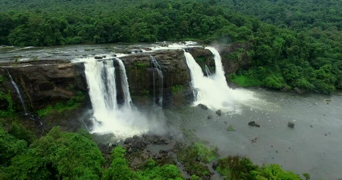 Athirapally Waterfalls cascading down, a majestic waterfall place to visit near Ernakulam.