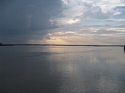 Migratory birds flocking at the serene Banke Tal wetland, a birdwatcher's paradise among places to visit in Lakhimpur Kheri.