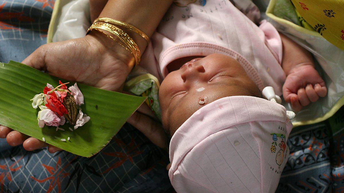 A family performing sacred Birth Ceremonies (Janam Sanskar), foundational rituals of Bihar.