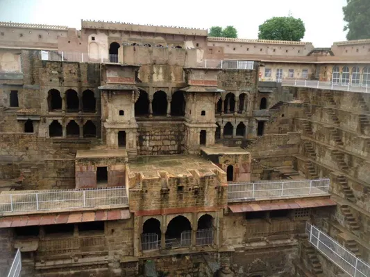 The ancient stepwell of Chand Baori near Kota, showcasing intricate geometric patterns and symmetrical architecture.