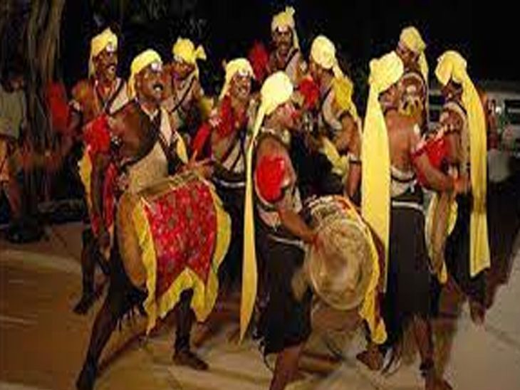 Performer in traditional attire dancing the Dhangari Gaja folk dance.