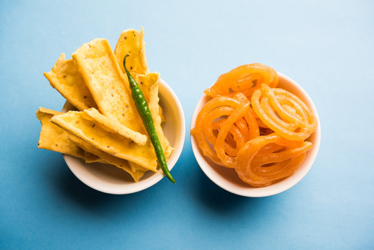 A plate of crispy Fafda with sweet Jalebi.