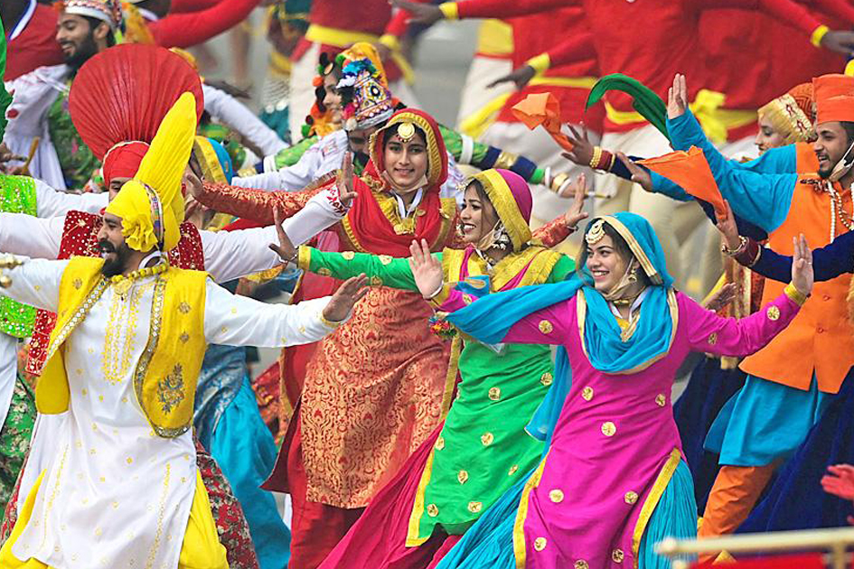 Dancers performing energetic Folk Music & Dance (Bhangra & Gidda).