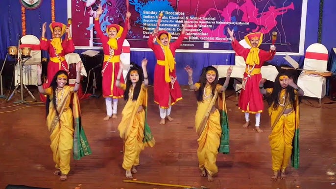 A Gondhalya performer in traditional attire invoking the goddess during a night-long ritual.
