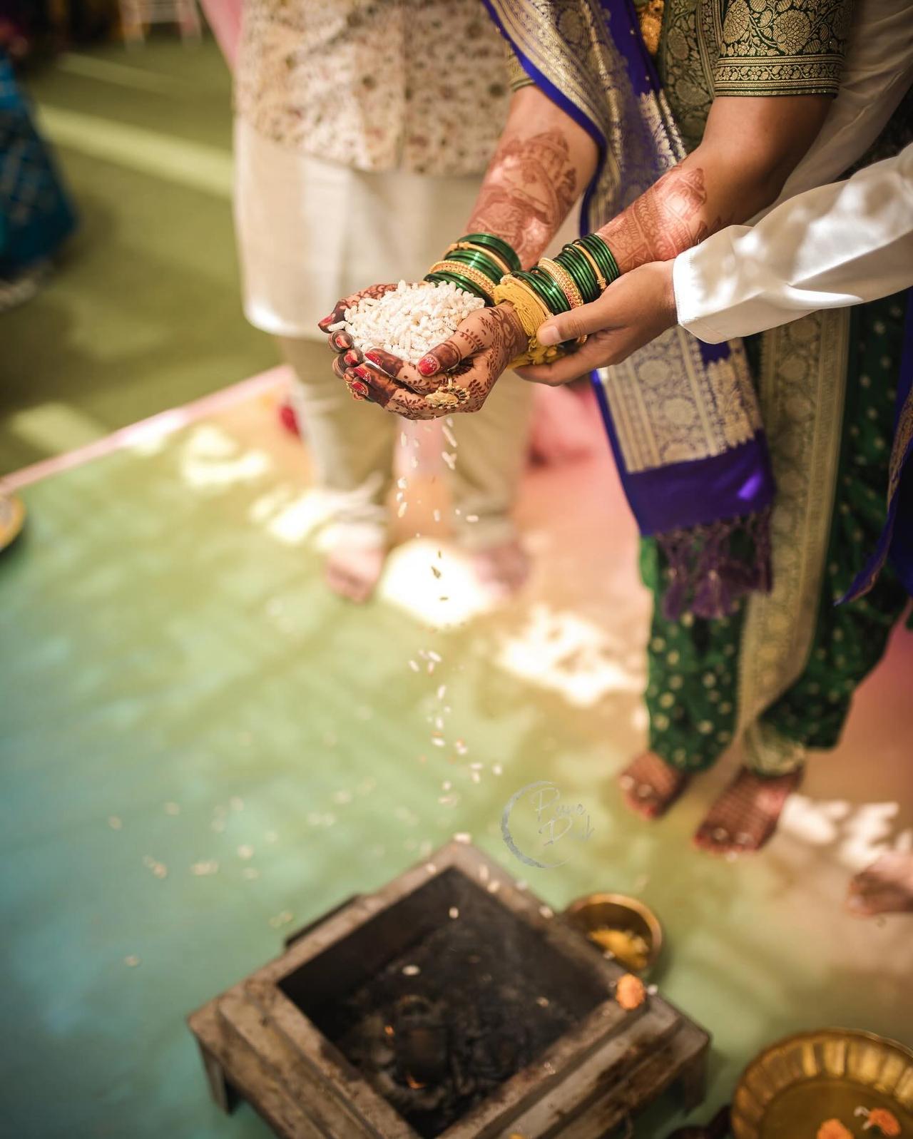 A family offering prayers at their ancestral Kuldaivat te.mple