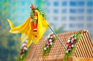 A festive image of a hoisted Gudi, symbolizing the celebration of Gudi Padwa, the iconic New Year festival of Maharashtra.