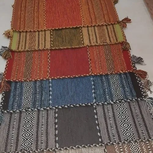 Colorful Panipati handloom durries displayed in various patterns and sizes for home decor.