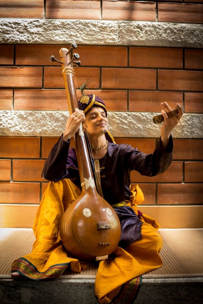 Solo performer narrating mythological tales through Harikatha singing.