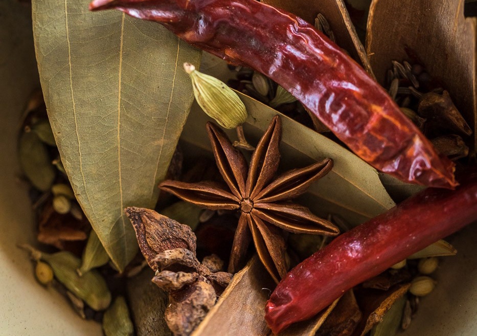 Preparation of traditional Kahwa tea with saffron and almonds in a samovar.