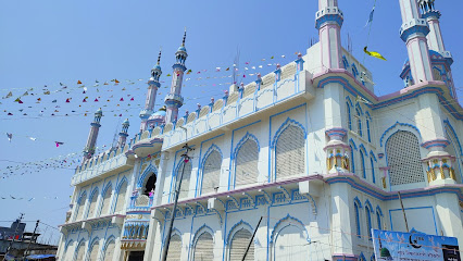 Intricate Islamic calligraphy and arches at Jama Masjid, an architectural wonder among places to visit in Lakhimpur Kheri.