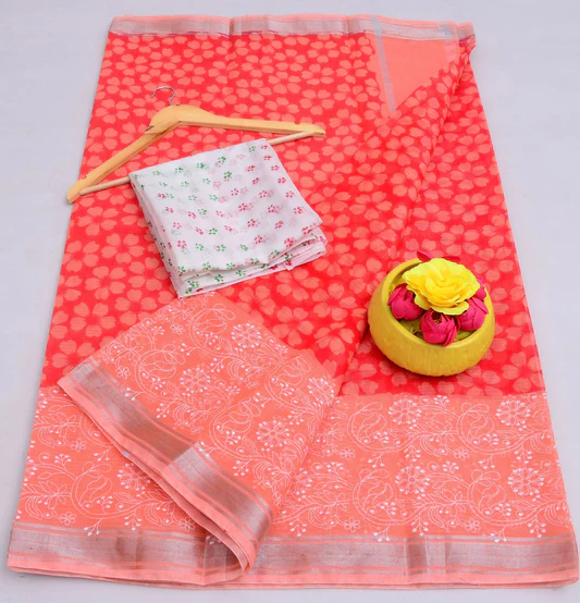 A woman draped in an elegant beige and gold Kota Doria saree, showcasing its distinctive square-check pattern.