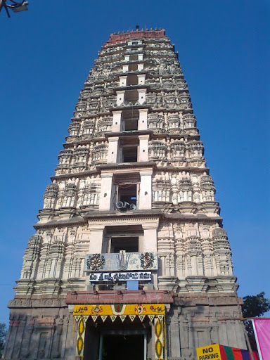 Devotees climbing the steps to the ancient Narasimha temple atop Mangalagiri hill.
