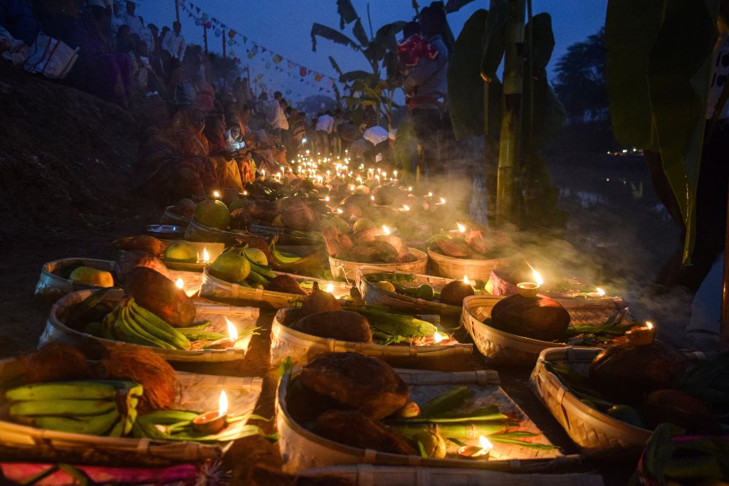 A ritual offering to a tree during Nature Worship (Prakriti Puja).