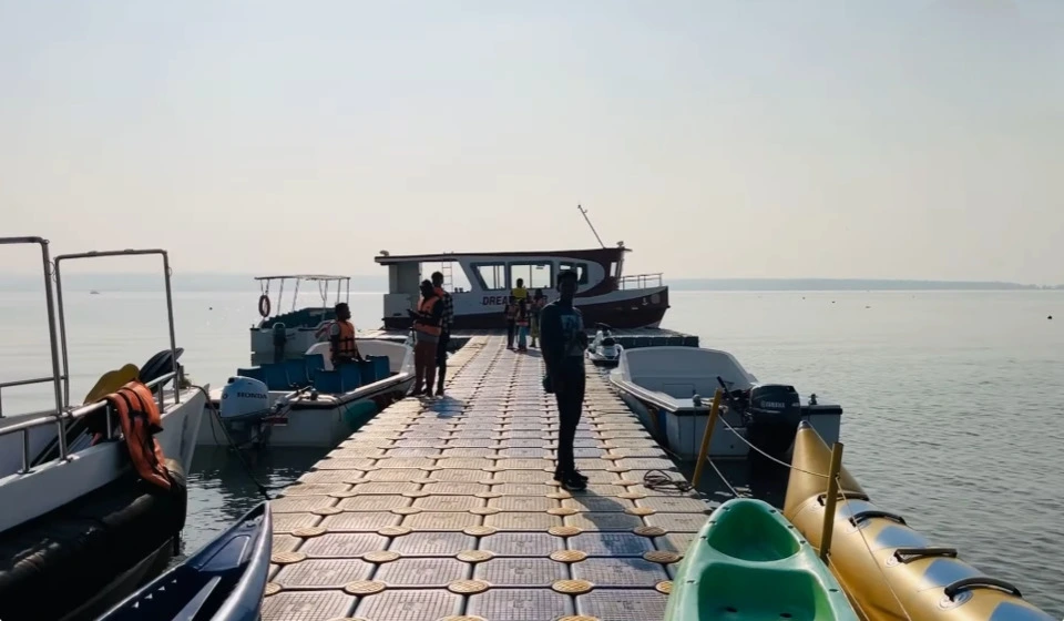 Tourists boating on the reservoir at Tandula Dam.