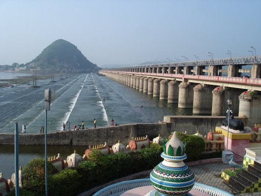 The illuminated arches of Prakasam Barrage at night, an engineering marvel place to visit near Amaravati.