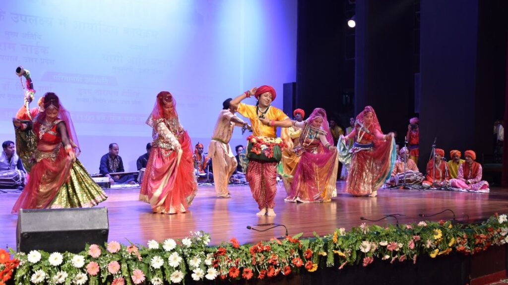 Performers dancing the Rai Nritya in traditional Bundeli attire.