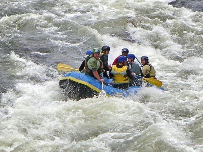 Rafting enthusiasts navigating rapids on Teesta River near jalpaiguri.