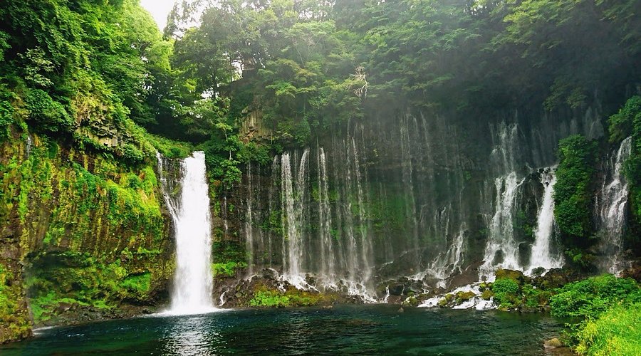 Saho Village & Waterfall with traditional slate-roofed houses.
