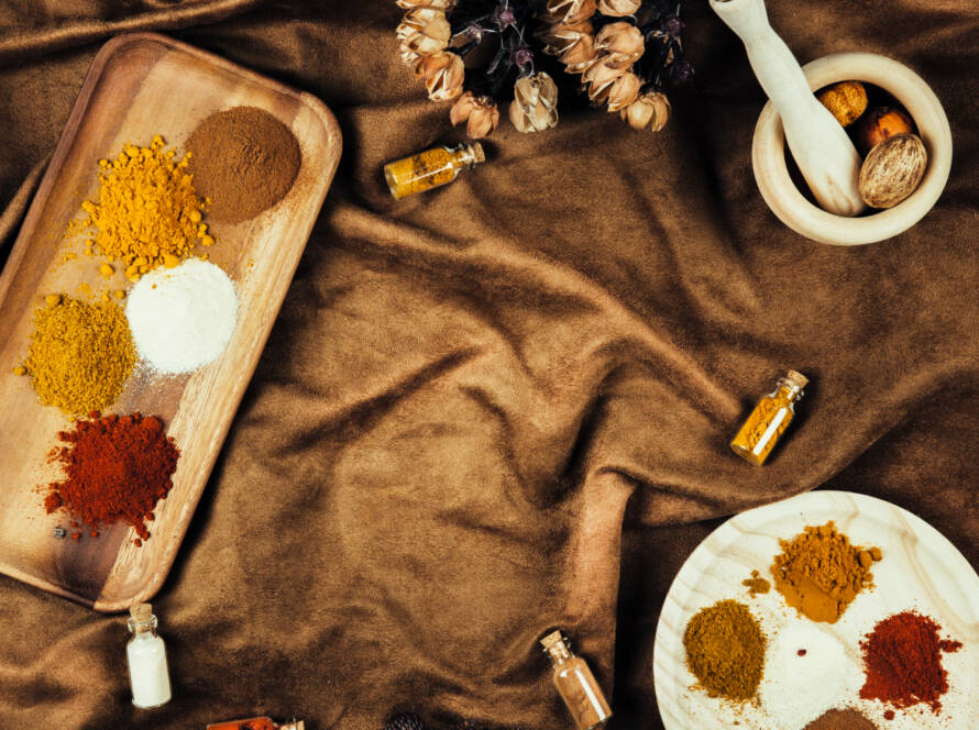 A selection of seasonal foods, including bitter greens (Haakh) for spring cleansing.