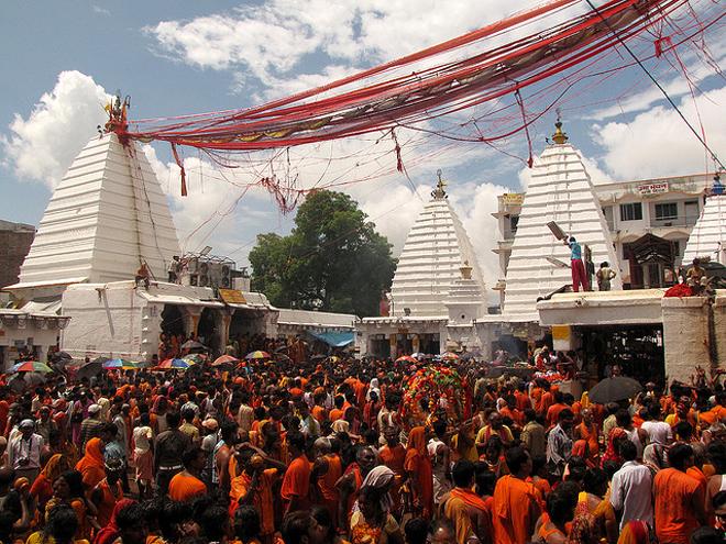 A vibrant crowd at a Temple Festival (Mela/Utsav), celebratory rituals of Bihar.