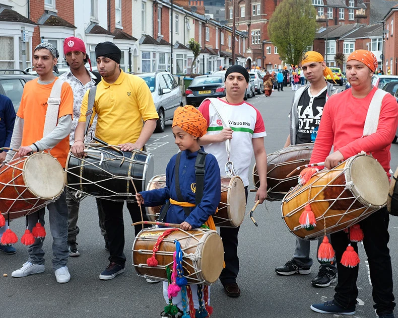 The vibrant procession and gathering at a Vaisakhi festival, harvest and cultural rituals of Punjab.