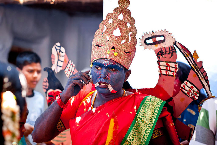 Villagers celebrating with a procession for their local Gramadevata.