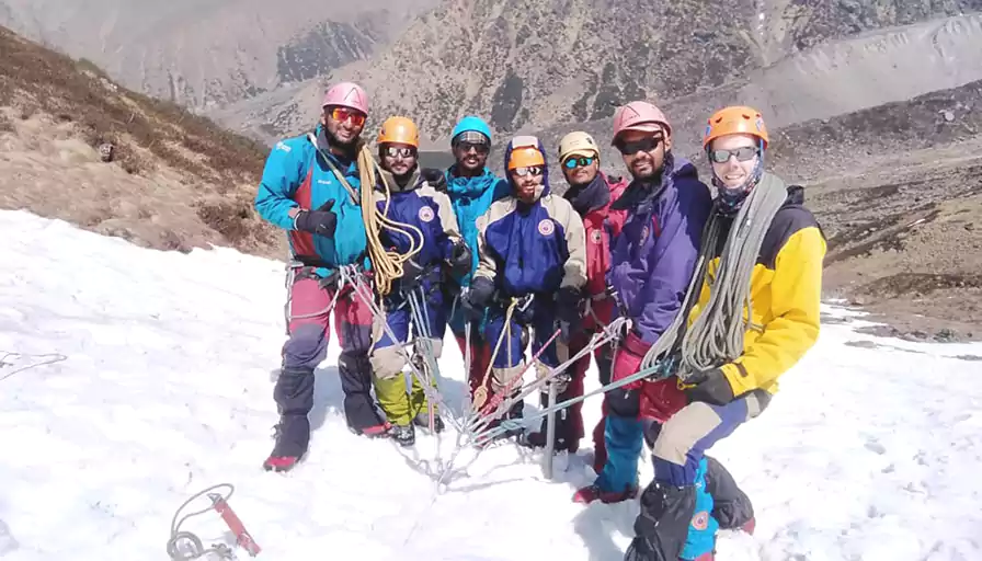 Trainees learning rock climbing techniques at NIM campus in Uttarkashi.
