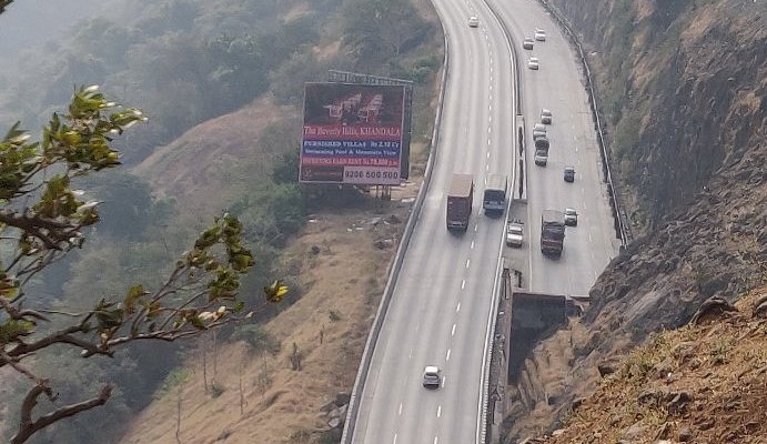 Spectacular mountain vista from Amrutanjan Point with clouds floating in valleys, a scenic places to visit Khandala for photographers.